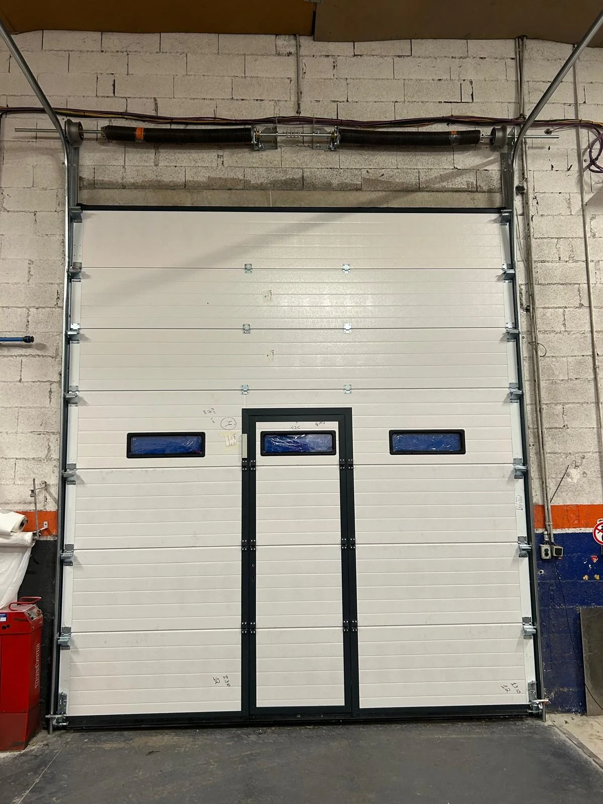 Remplacement de panneau de porte sectionnelle à Perpignan